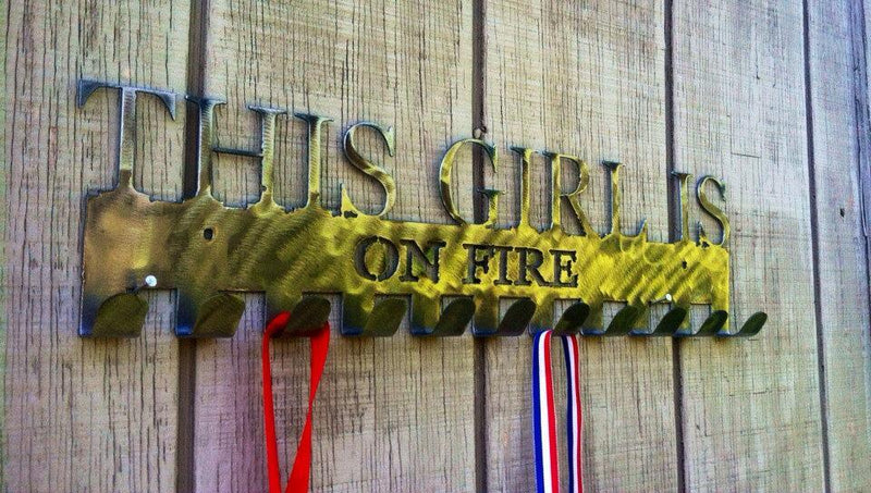 This girl is on fire medal display